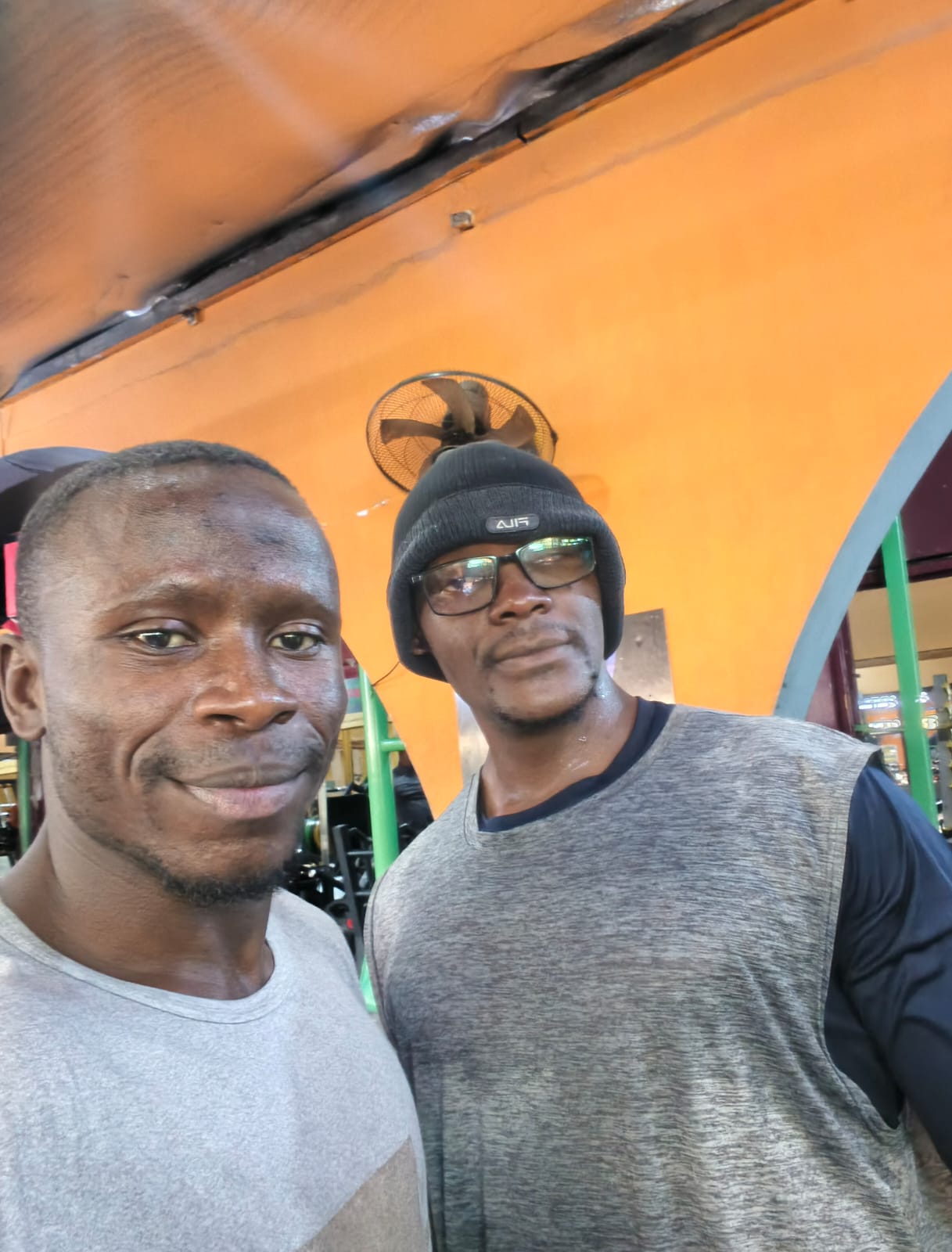 Training with a friend in the gym